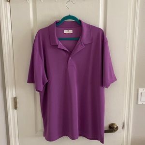 Grand Slam performance. Mens golf polo in light purple.